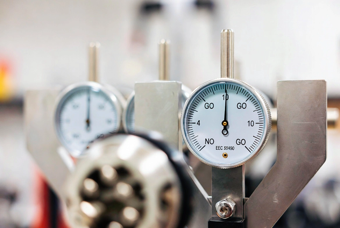 Close-up of KingPo IEC 60309 Go/No-Go compliance gauges during precision testing.