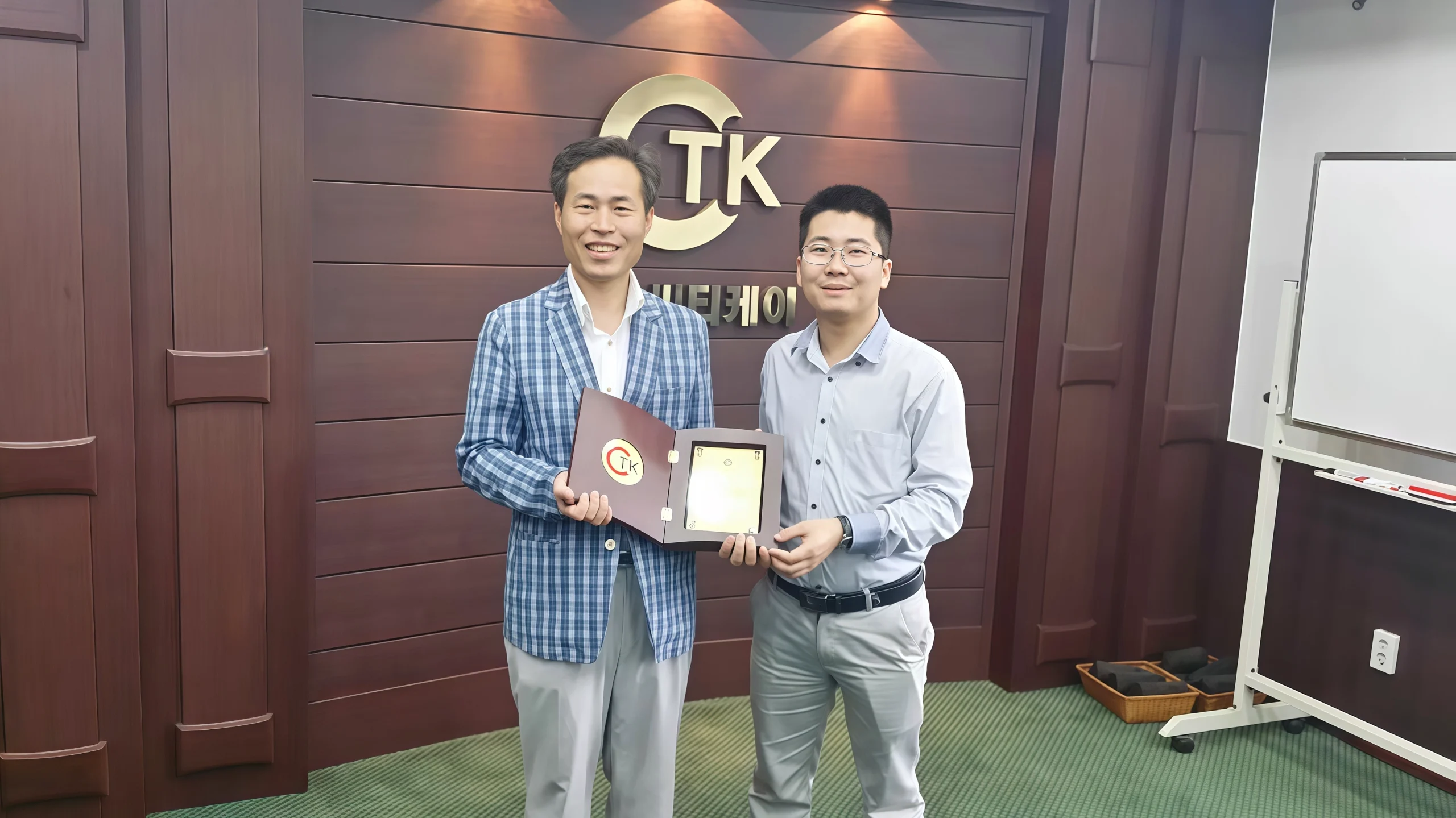 KingPo CTK IEC 60529 IP test equipment – KingPo and CTK Co., Ltd. Korea representatives holding certificate at CTK laboratory in 2014