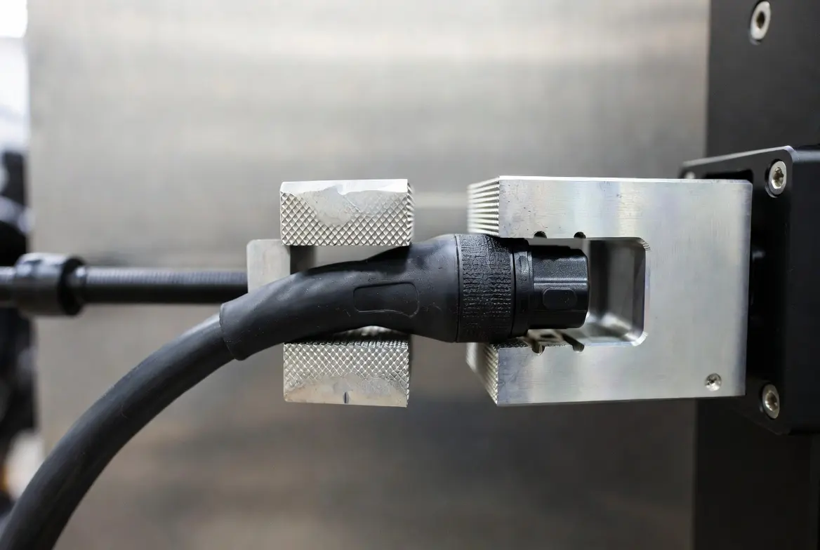 real EV charging cable secured in KingPo EV charger tester fixture