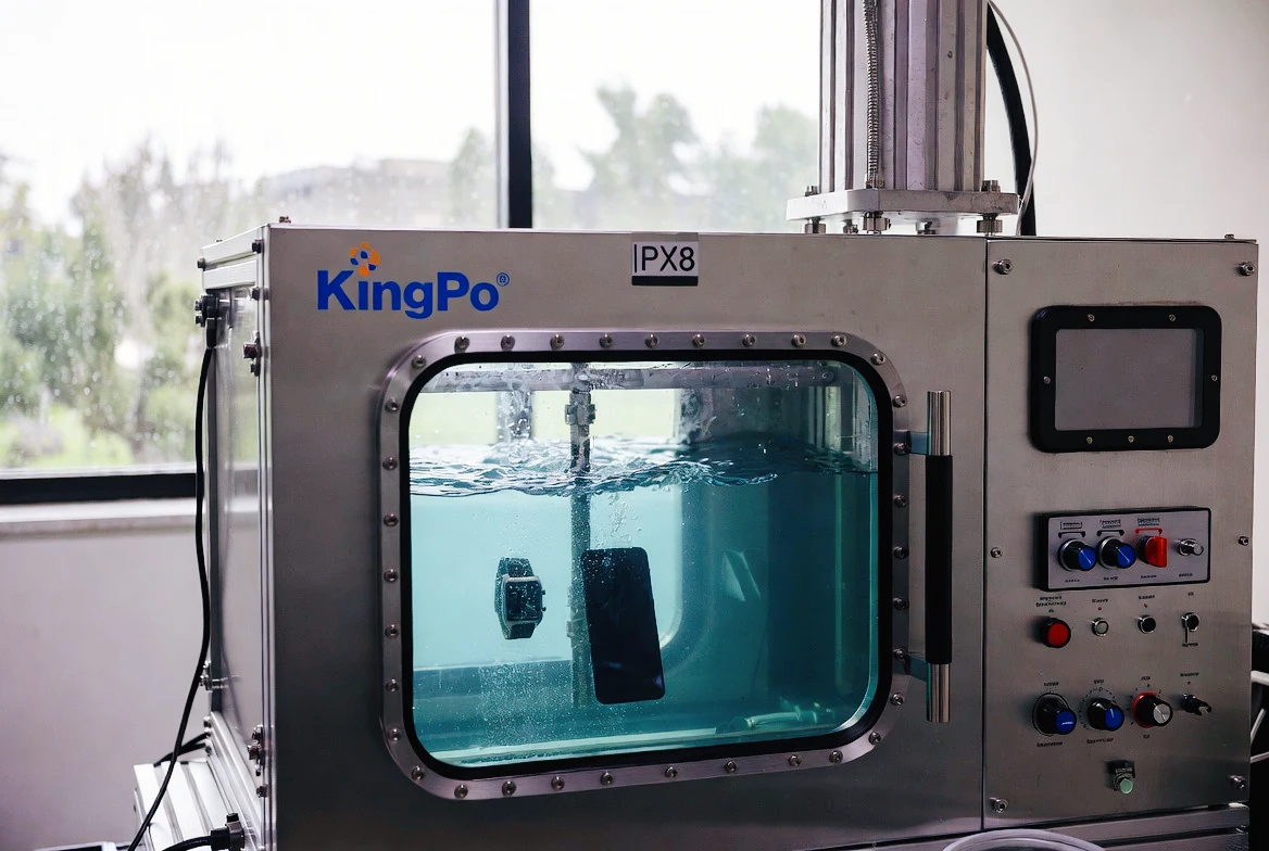 KingPo IPX8 Water Immersion Test Chamber testing outdoor electronics in rainy weather simulation.