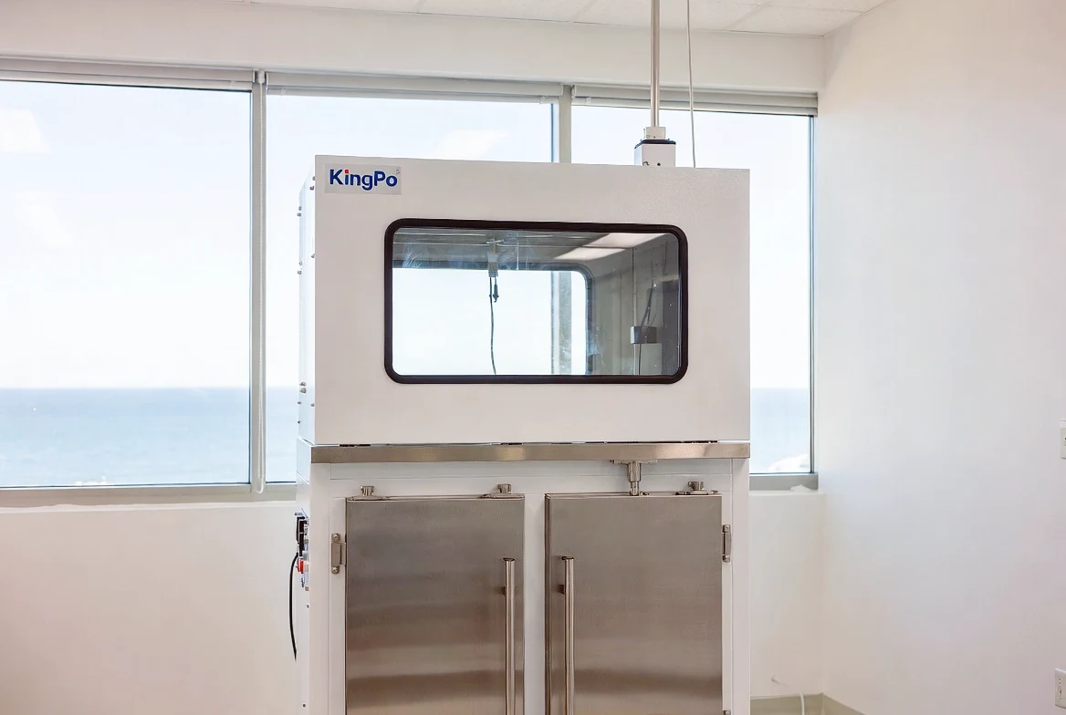 KingPo IPX8 Water Immersion Test Chamber in bright laboratory with natural light and ocean view.