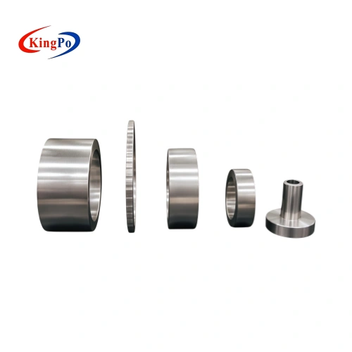 Precision stainless steel protrusion test gauge set for ISO 8124-1:2014 Clause 6.7.1.2 toy safety testing, professionally arranged on a laboratory workbench showing multiple ring sizes and knurled component.