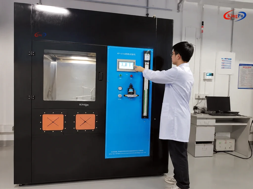 Laboratory technician operating UL 1581 VW-1 FT1 Flame Test Chamber for cable flammability testing