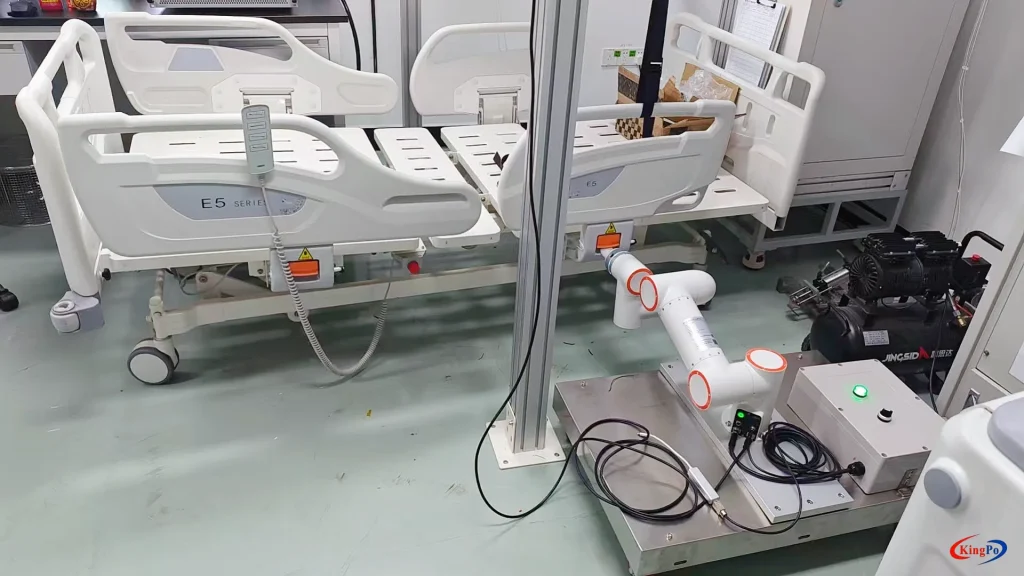 Robotic arm setup for IEC 60601-2-52 related medical bed side rail and latch reliability testing