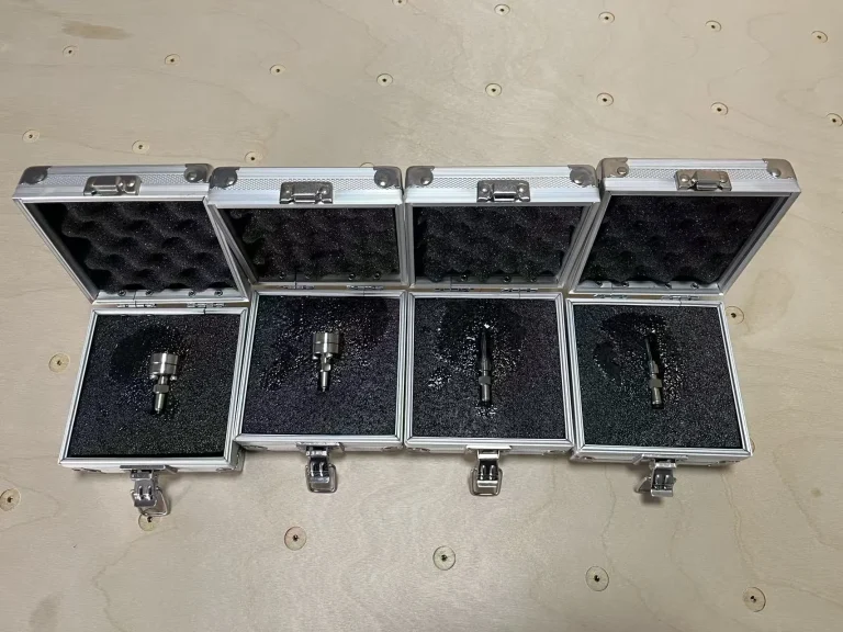 ISO 80369-7 Luer Reference Gauges packed in protective plastic cases for laboratory testing