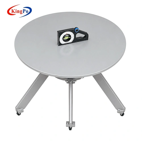 Elevated top view of IEC 60335-1 stability test equipment with circular inclined plane and angle gauge