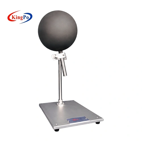 Right-angled view of the IEC 60335-2-23 wooden sphere and positioning fixture in a testing laboratory.