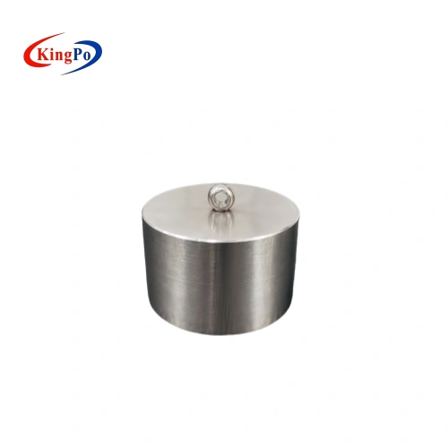 IEC 60335-2-3 Steel Cylinder for Clause 20.102 ironing board impact stability testing, shown on a laboratory anti-slip test surface.