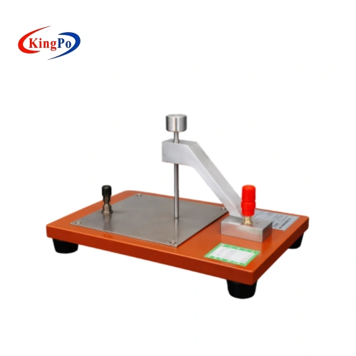 Side view of the IEC 61347-1 Annex H Insulating Barrier Test Equipment showing the Figure H.1 electrode structure for solid insulation testing.