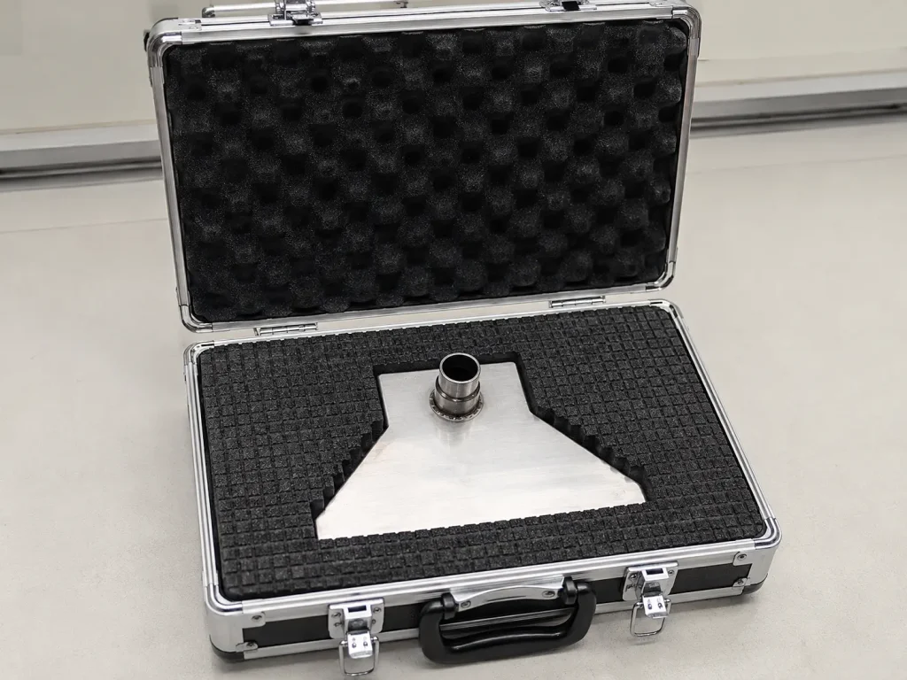 Protective aluminum carrying case for ISO 16750-4 splash test nozzle transportation and storage